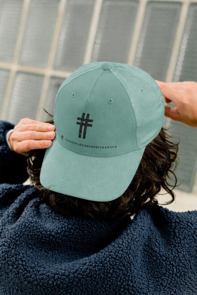 Logodesign for Trosopplæringskonferansen. Logo på caps